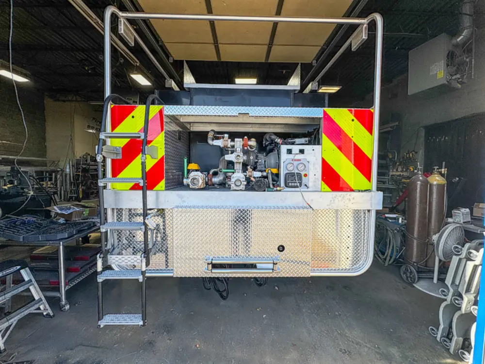 Engine and hose connection hardware detail, photo 79 of 303.